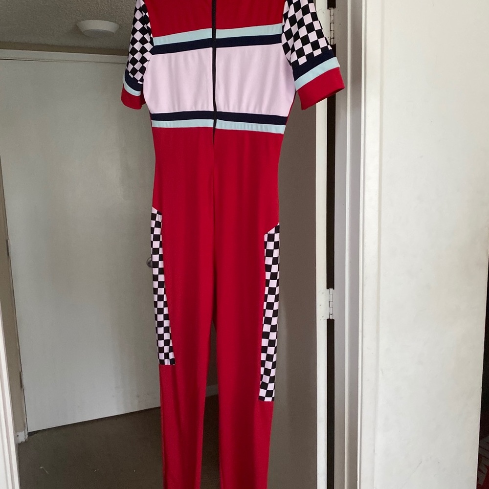 Cute fashion no a race track jumpsuit .